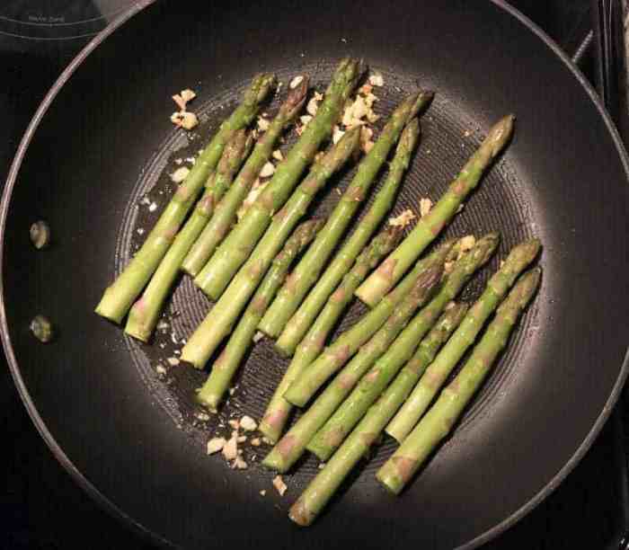 Asparagus seared pan serve garlic sauce soy heat immediately tender firm remove when but